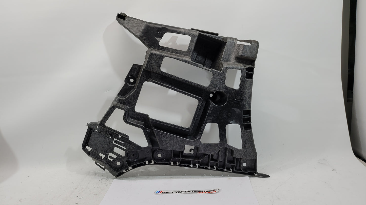 BMW G80 M3 rear left bumper holder bracket by MPerformance.parts, showing the metal support with mounting points and attachment details.