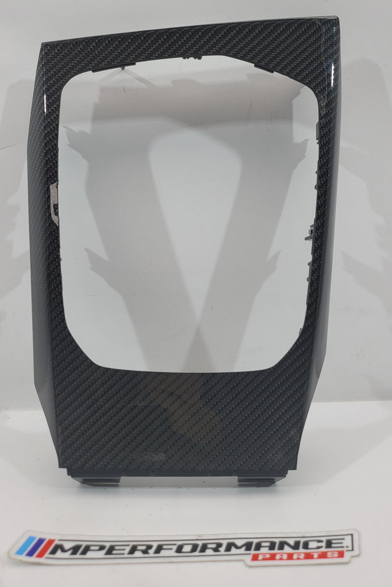 BMW M3 G80 interior gearstick surround in gloss carbon trim, showcasing sleek, high-quality finish and detailed craftsmanship.