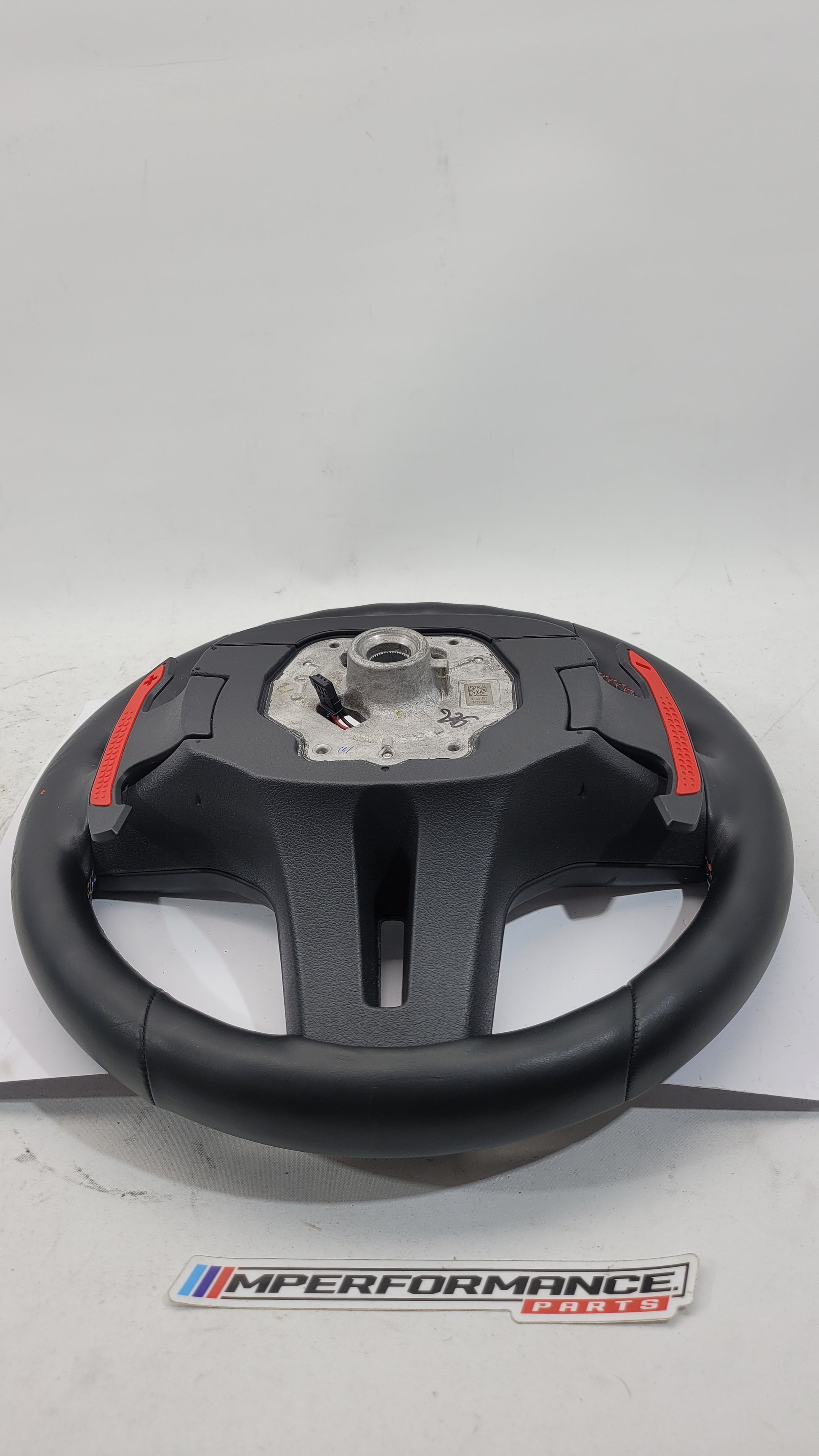 BMW M2 M3 M4 G80 G82 leather M steering wheel with MPerformance.parts branding, featuring sporty design and detailed stitching.