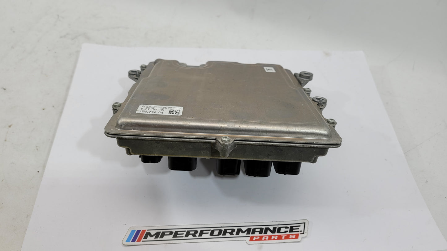 BMW M4 F82 3.0 petrol engine control module by MPerformance.parts, showing the black electronic module with connectors and branding.