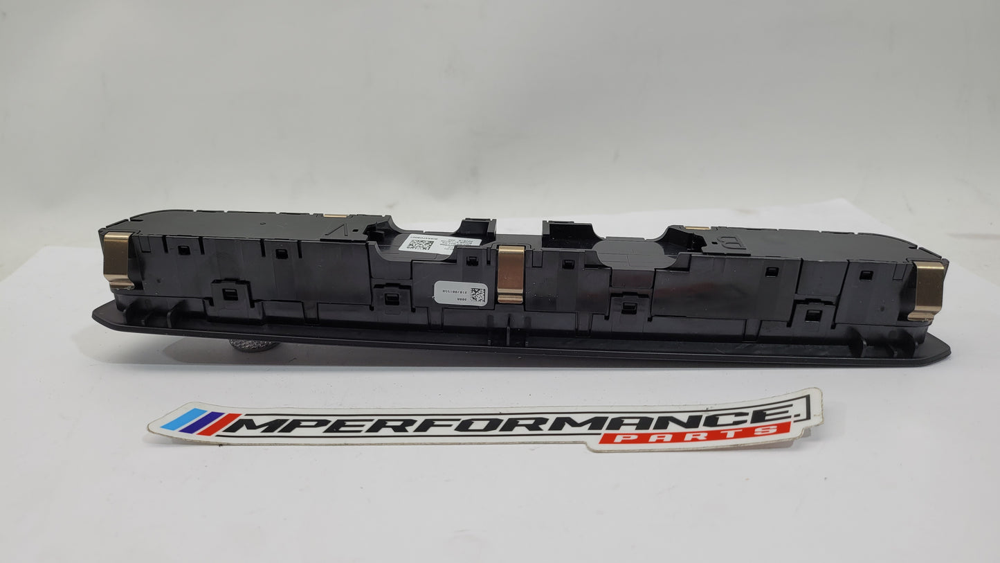 BMW G22 G80 M3 Competition radio control trim part by MPerformance.parts, showcasing the sleek, black interior trim piece.