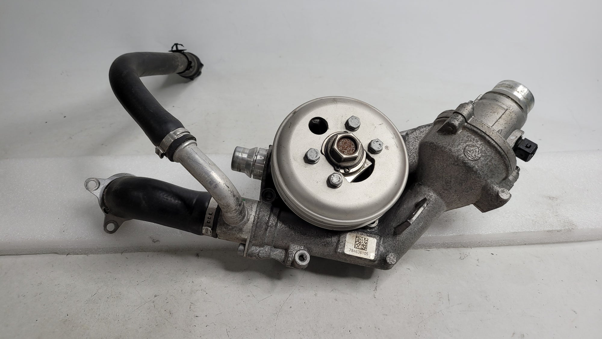 MPerformance.parts F80 F82 F87 water pump for M2 Competition, M3, and M4 models, showcasing the pump with metal and plastic components.
