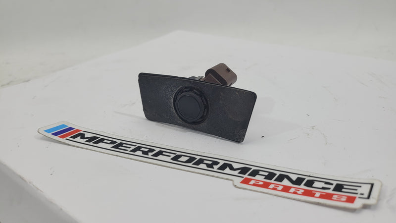 BMW M2 G87 bumper parking distance sensor by MPerformance.parts, showing close-up of the sensor embedded in the bumper.