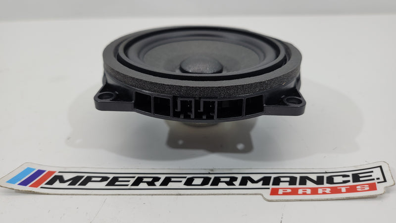 BMW G80 M3 front door speaker by MPerformance.parts, showing the black speaker with mounting details inside a vehicle door