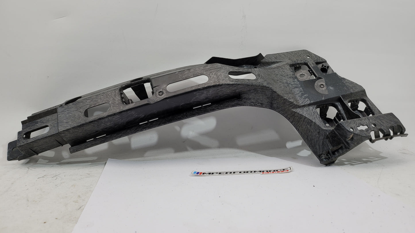 BMW M3 G80 rear left passenger side bumper bracket mount, showing the metal mounting bracket with bolt holes.