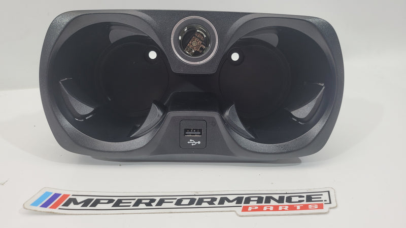 BMW M3 G80 cup holder by MPerformance.parts, showing the sleek interior fitment and design details of the cup holder.
