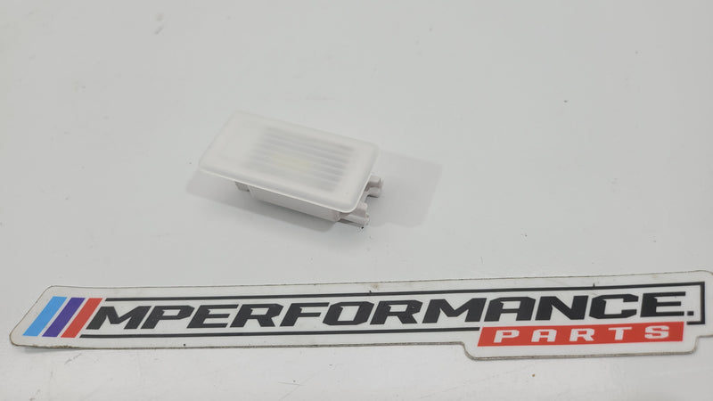 BMW M3 G80 boot interior light, 6W699813403, installed inside the trunk showing the LED illumination and interior details.