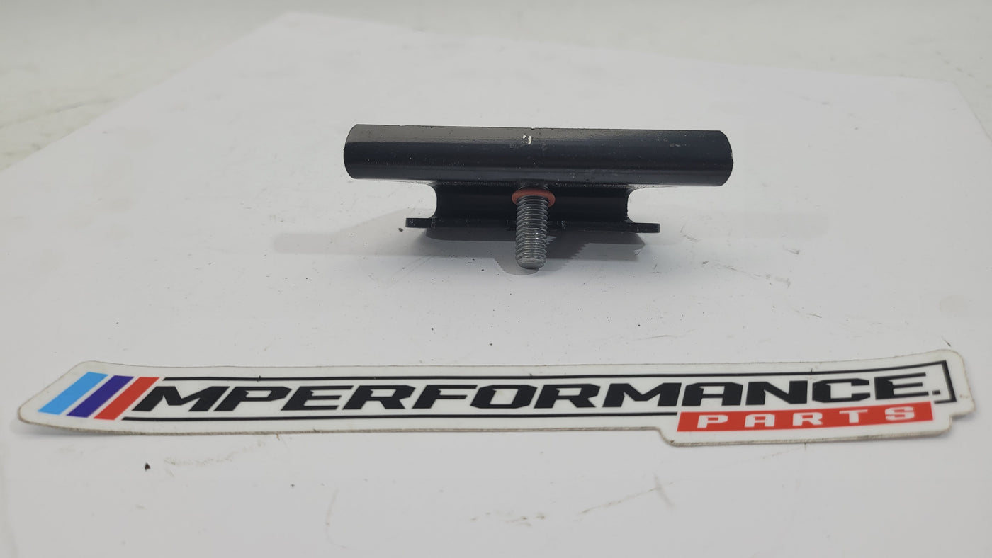 BMW M3 G8x battery bracket by MPerformance.parts, showing the black metal support with mounting points for engine compartment.