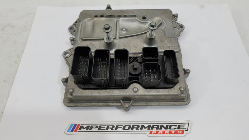 BMW M4 F82 3.0 petrol engine control module by MPerformance.parts, showing the electronic component with connectors and branding.