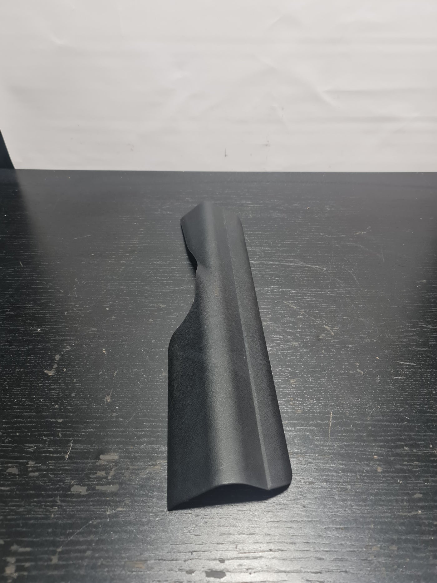 High-performance car part from MPerformance.parts, showcasing a sleek, durable component with a metallic finish.