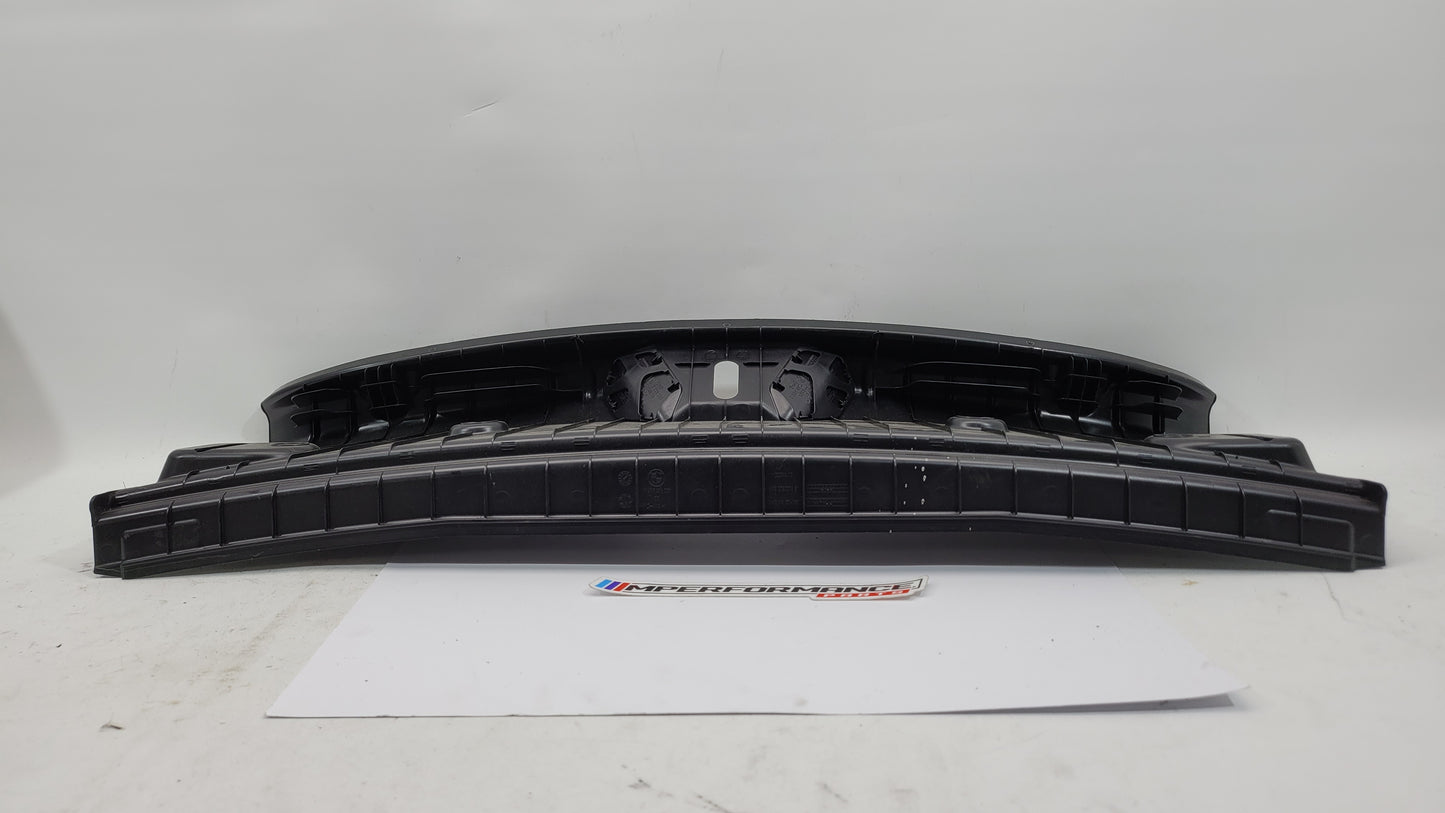 BMW 2 Series F22 and F87 coupe trunk lock trim in black with MPerformance.parts logo, designed for authentic fit and finish.
