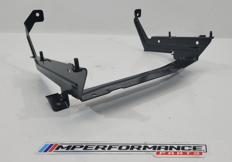 BMW E92 battery bracket by MPerformance.parts, showing the black metal component with mounting points for secure battery installation.