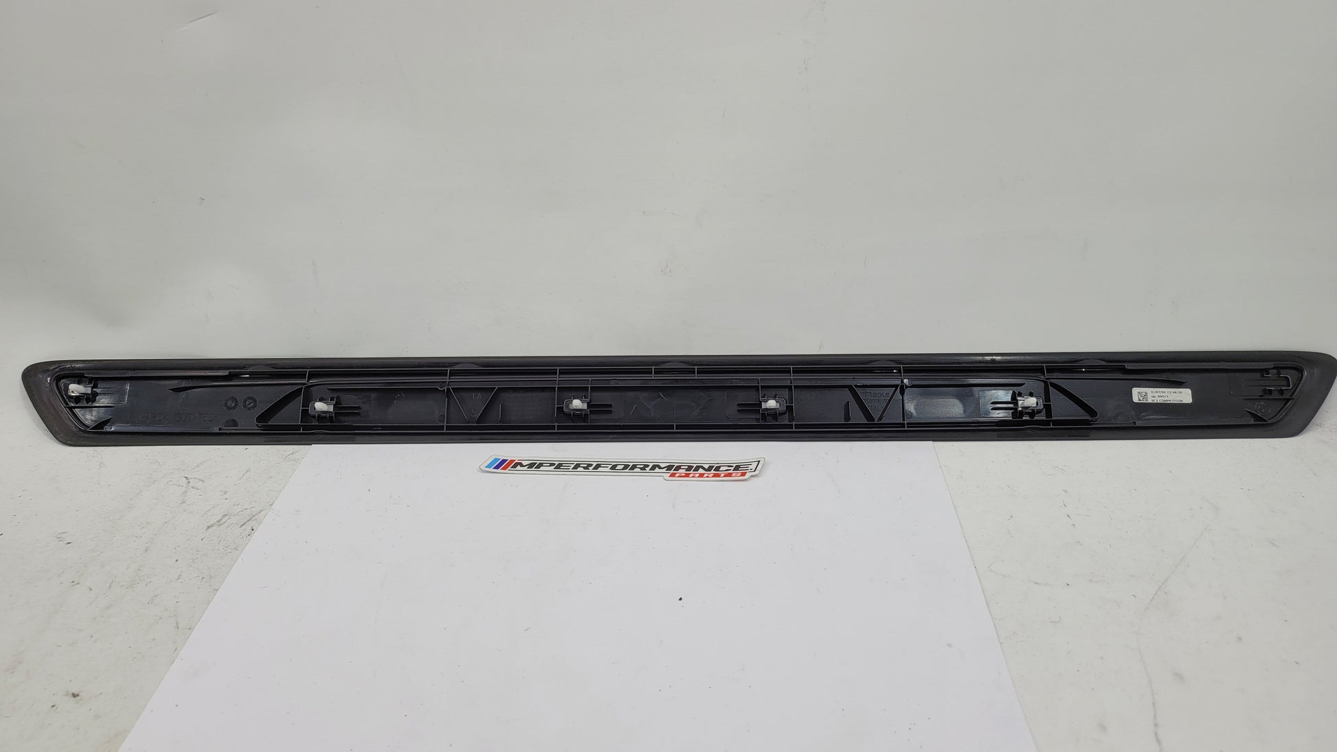 BMW M2 Competition F87 door sill scuff plate, left or right side, MPerformance.parts, close-up of black protective trim.