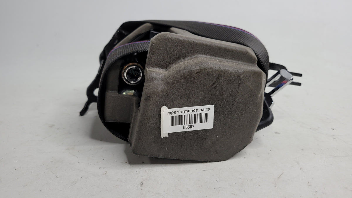 BMW MPerformance.parts brake caliper in black with M logo, close-up view showing detailed design and branding.
