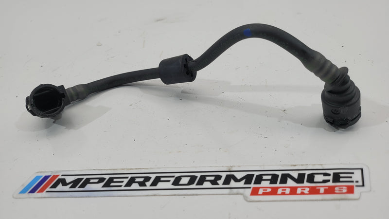 BMW M3 G80 G81 M4 G82 G83 M2 G87 engine coolant pipe hose from MPerformance.parts, showing the flexible rubber hose with metal fittings.