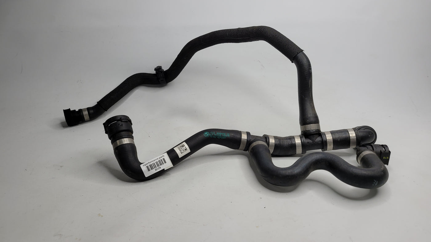 BMW M3 M4 G80 G82 G83 hose pipe assembly by MPerformance.parts, showing the detailed black rubber and metal fittings.