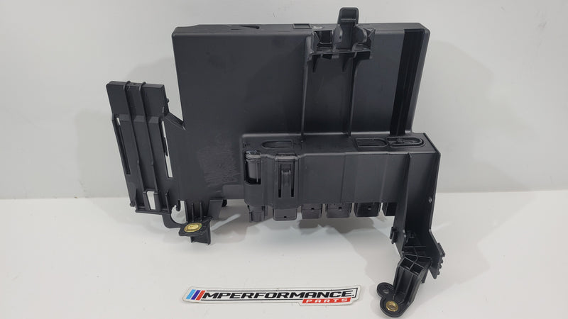 BMW M3 M4 G80 G82 G83 ECU power distributor cover holder by MPerformance.parts, close-up view showing durable black component.