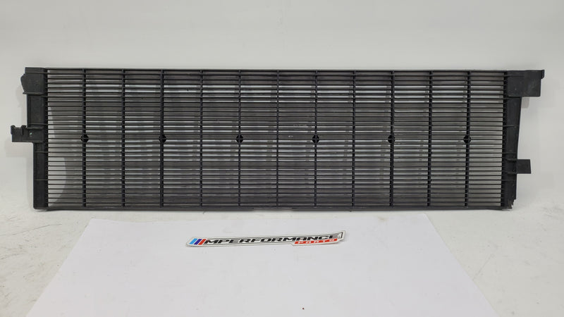 BMW G80 G82 G83 M3 M4 Competition plastic radiator cover shroud by MPerformance.parts, showing the black engine bay component.