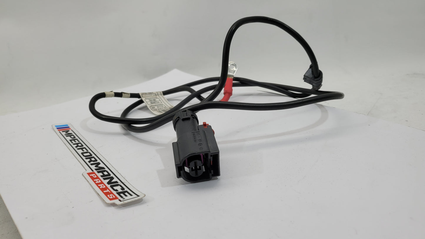 BMW F83 M4 positive battery power distribution cable by MPerformance.parts, showing the cable with connectors and wiring for engine bay use