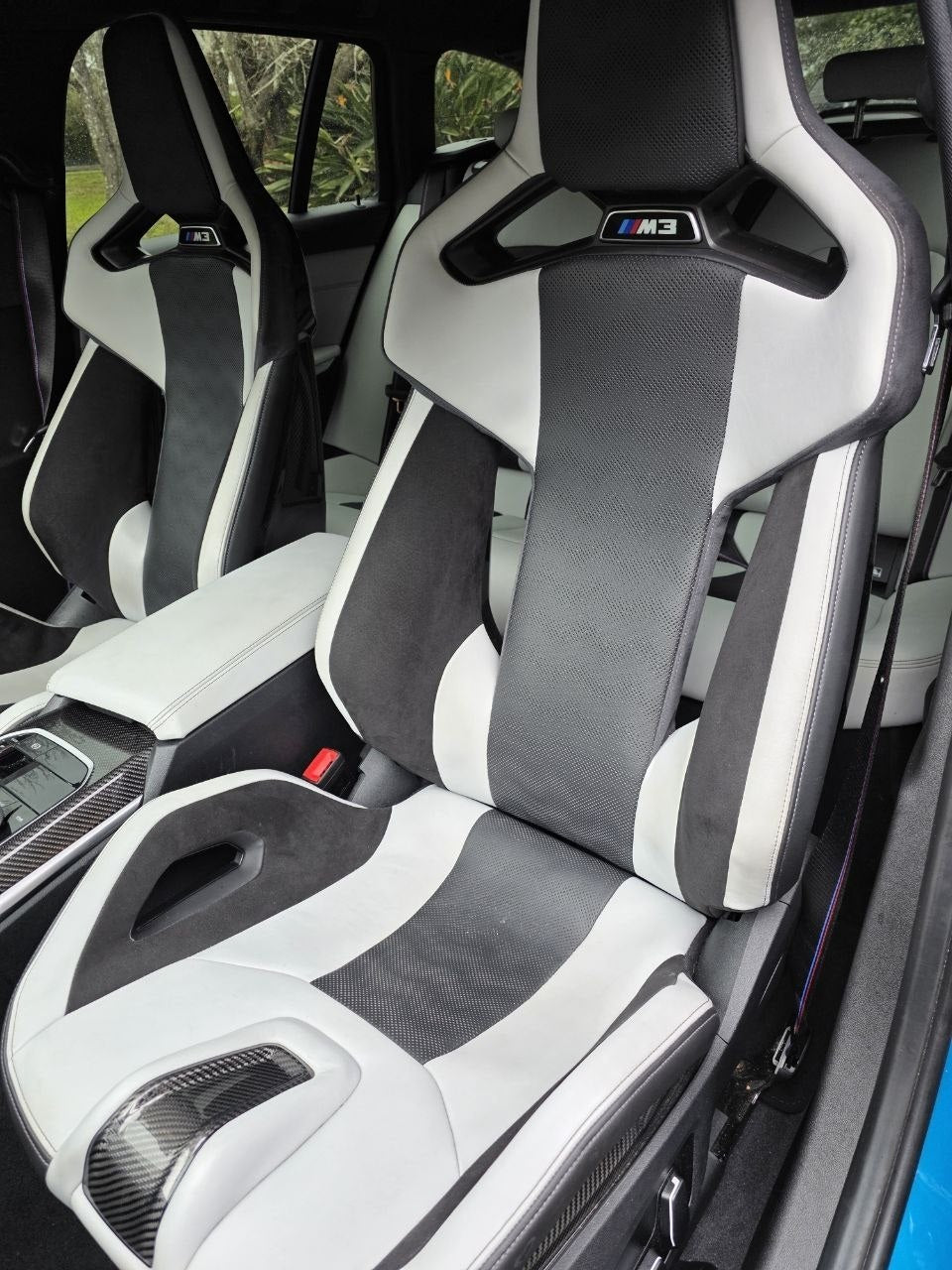 BMW G80 M3 Silverstone carbon bucket seats installed interior detail image 3