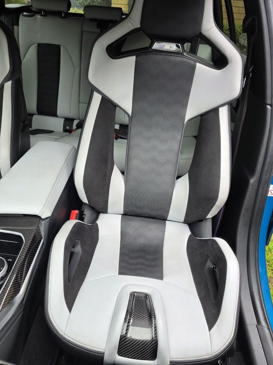 BMW G80 M3 Silverstone carbon bucket seats installed interior detail image 4