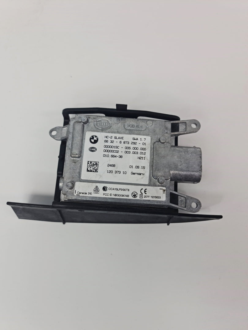 BMW F80/82 M3 M4 lane change warning blind spot sensor, close-up of the sensor component for vehicle safety system.