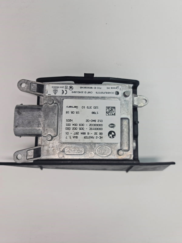 BMW F80/82 M3 M4 lane change warning blind spot sensor, close-up of the sensor component for vehicle safety.