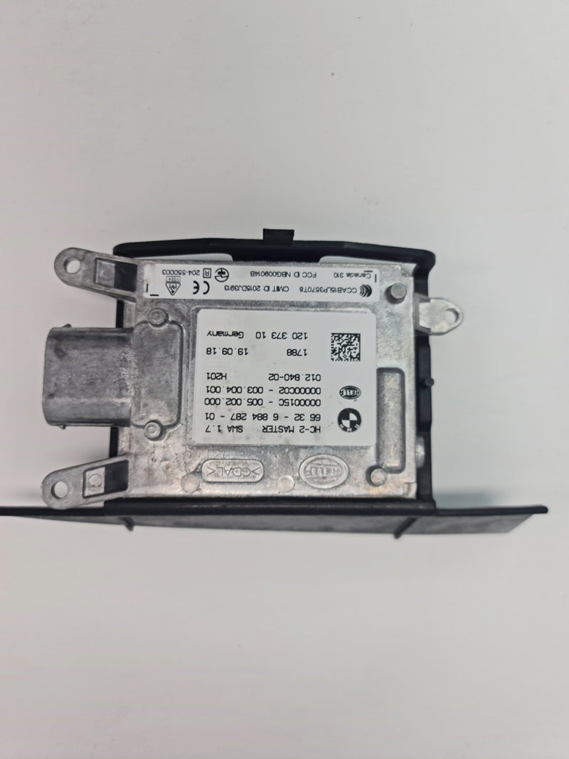 BMW F80/82 M3 M4 lane change warning blind spot sensor, close-up of the sensor component for vehicle safety.