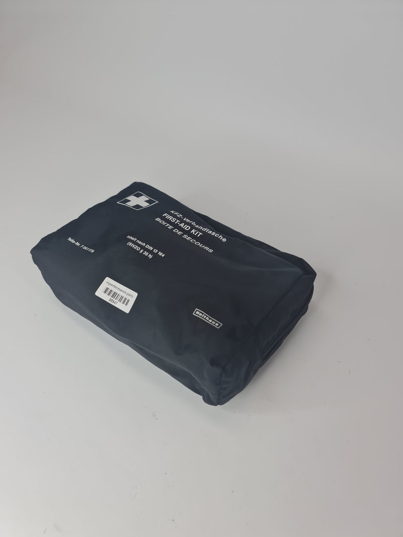 BMW 7 & 5 Series E32 E34 OEM first aid kit, compact medical kit with first aid supplies, branded by BMW.