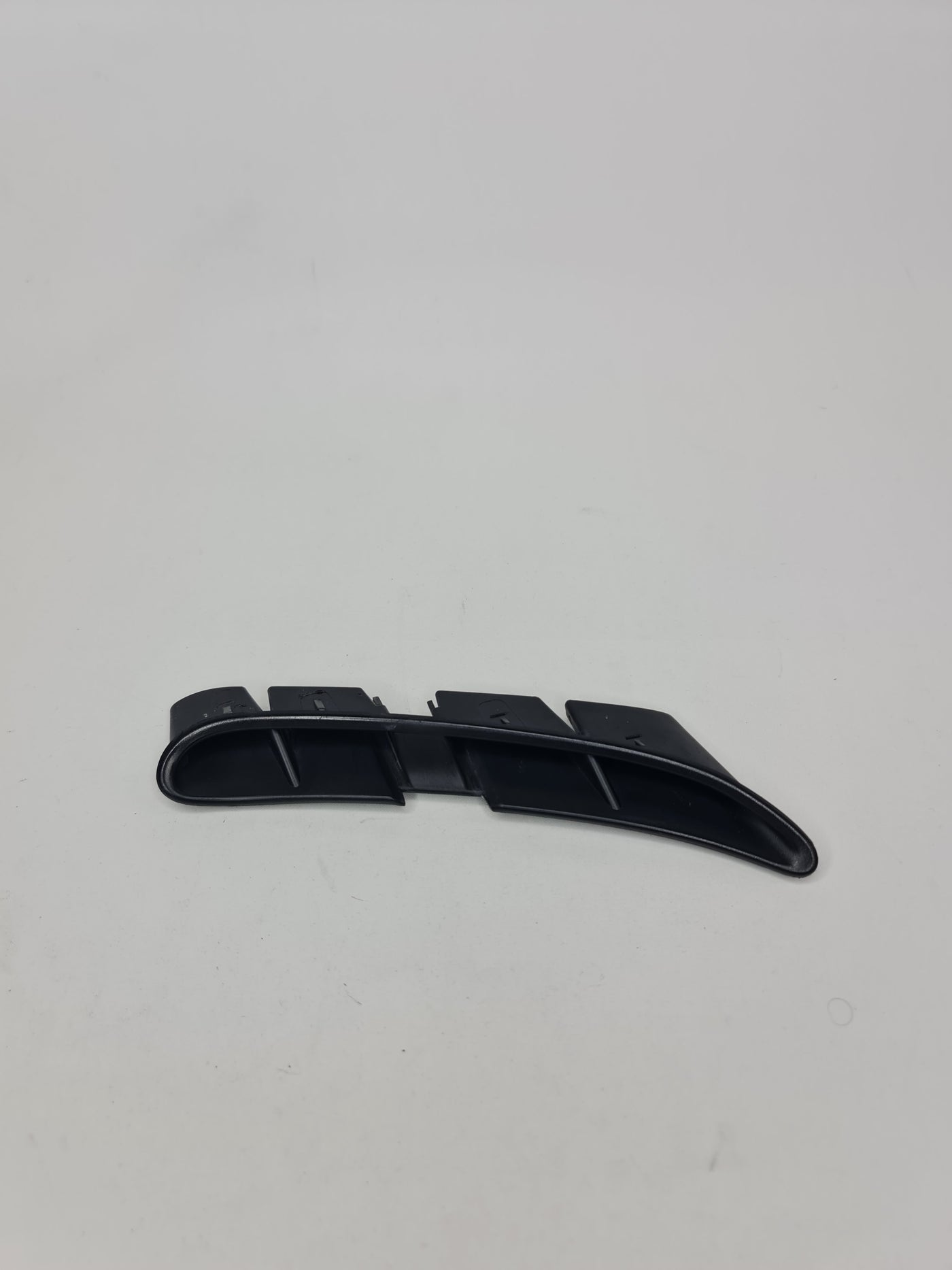BMW M4 Competition 4 Series right front fender side grill vent air duct, close-up view showing the vent's design and fit.