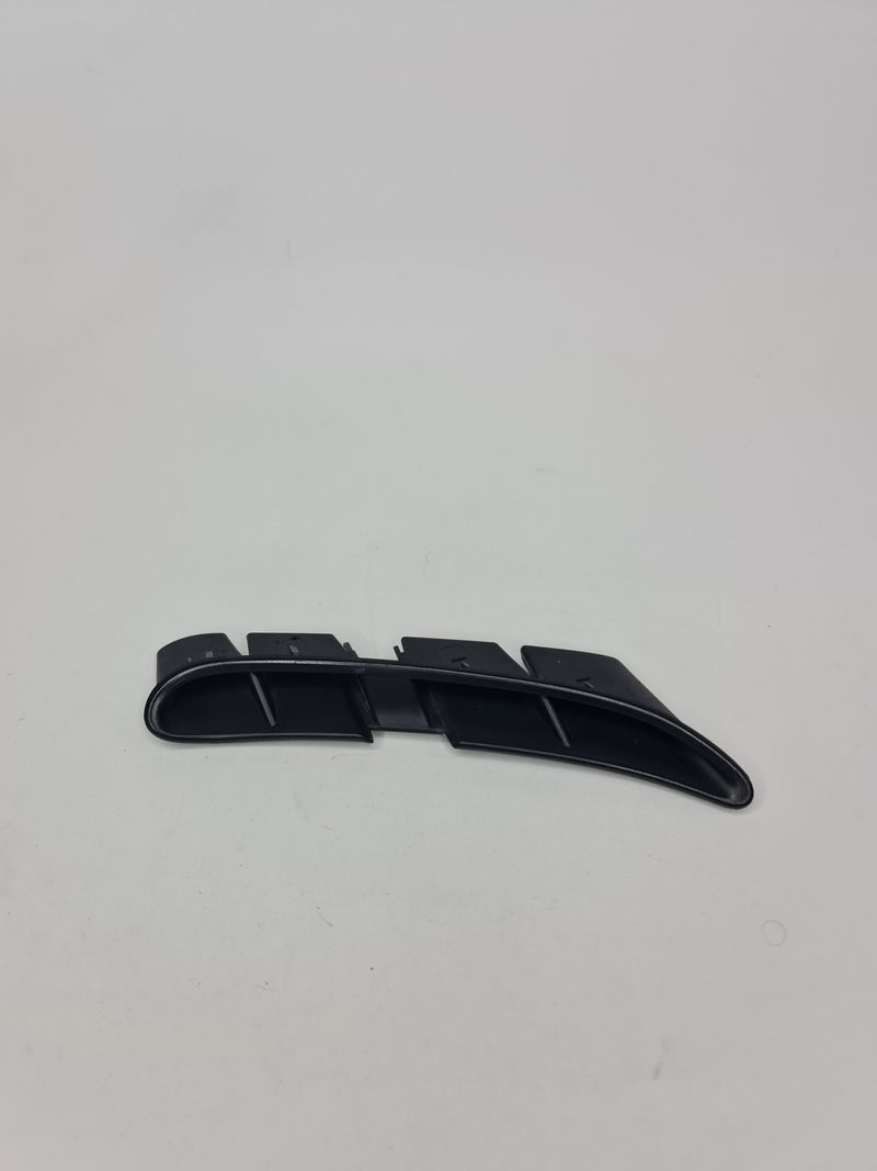 BMW M4 Competition 4 Series right front fender side grill vent air duct, close-up view showing the vent's design and fit.