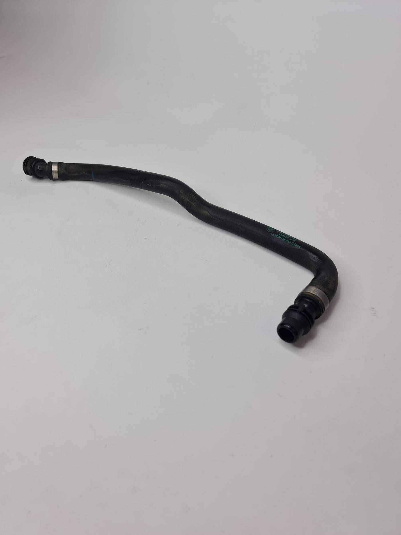 BMW coolant pump hose for engine feed, fits 2015-2020 models, black rubber tube with clamps, part number 64219307240.