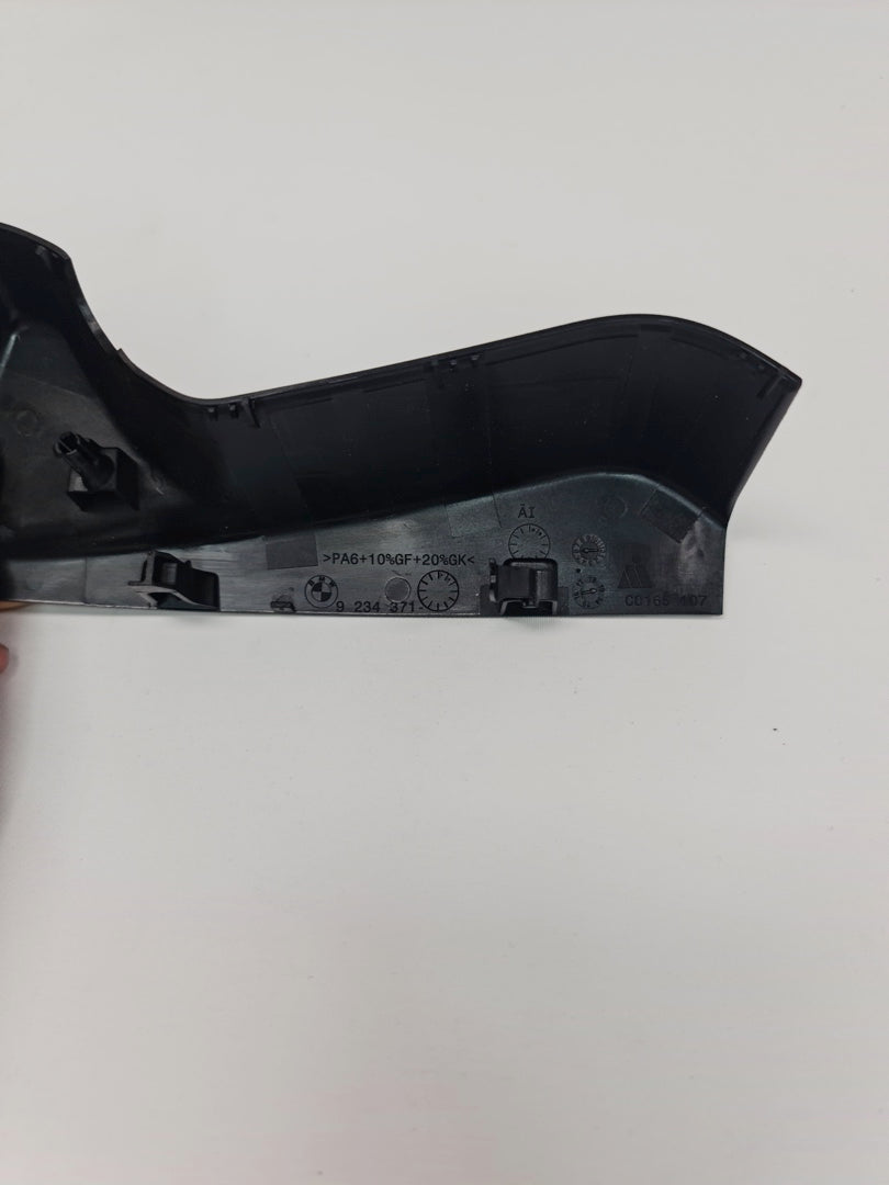 BMW M3 M4 F80 F82 F83 interior rear view mirror surround cover trim, close-up view of the black plastic trim piece.