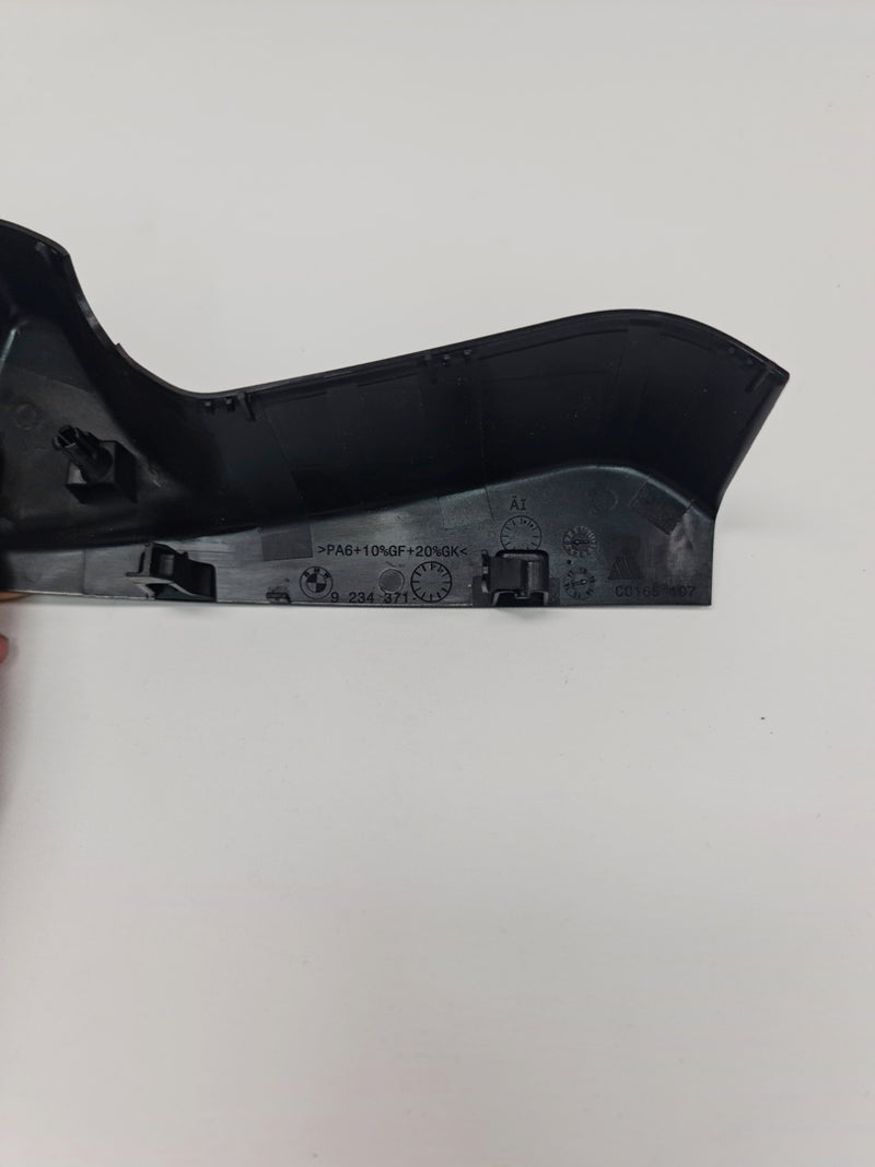 BMW M3 M4 F80 F82 F83 interior rear view mirror surround cover trim, close-up view of the black plastic trim piece.