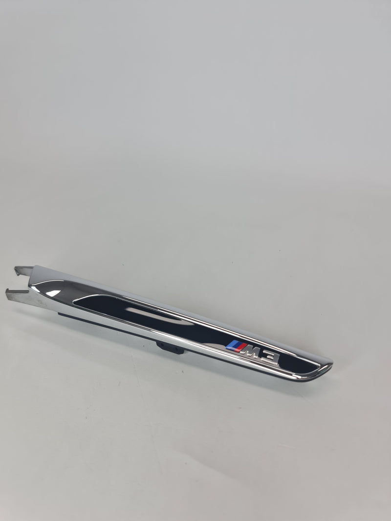 BMW M4 left molding from 2015-2020, black exterior trim piece, designed for BMW 51138055333 vehicle repair or replacement.