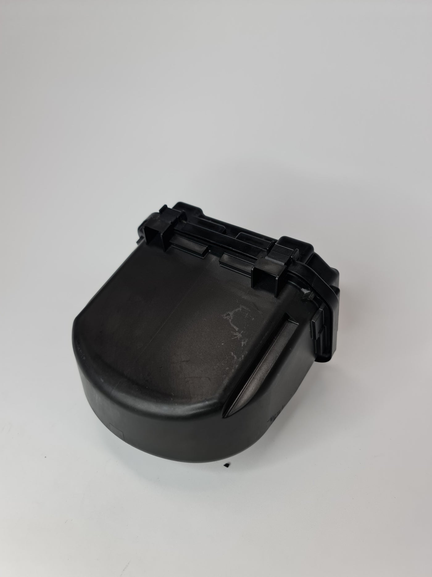 BMW 1 Series F21 M135 power distribution fuse box, black plastic with multiple fuse slots and electrical connectors.